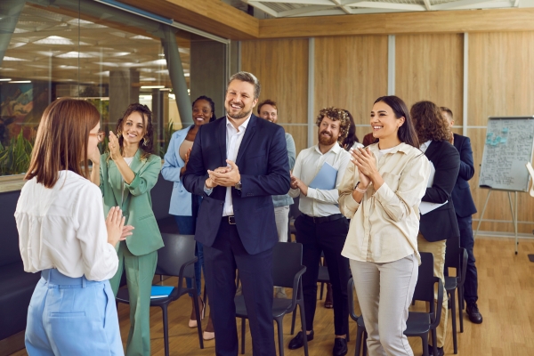Woman training leading an in-office training session